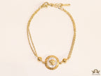 Double chain Medusa bracelet in gold