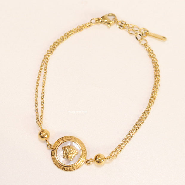 Double chain Medusa bracelet in gold