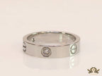 Narrow 4.5mm platinum plated band with screws and stones