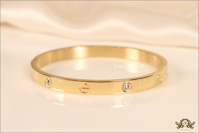 Women's Gold Plated bracelet with screws and zircons