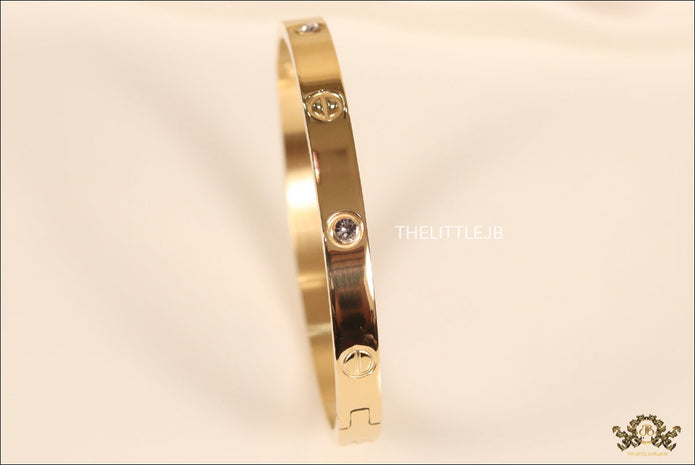 Women's Gold Plated bracelet with screws and zircons