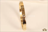 Women's Gold Plated bracelet with screws and zircons