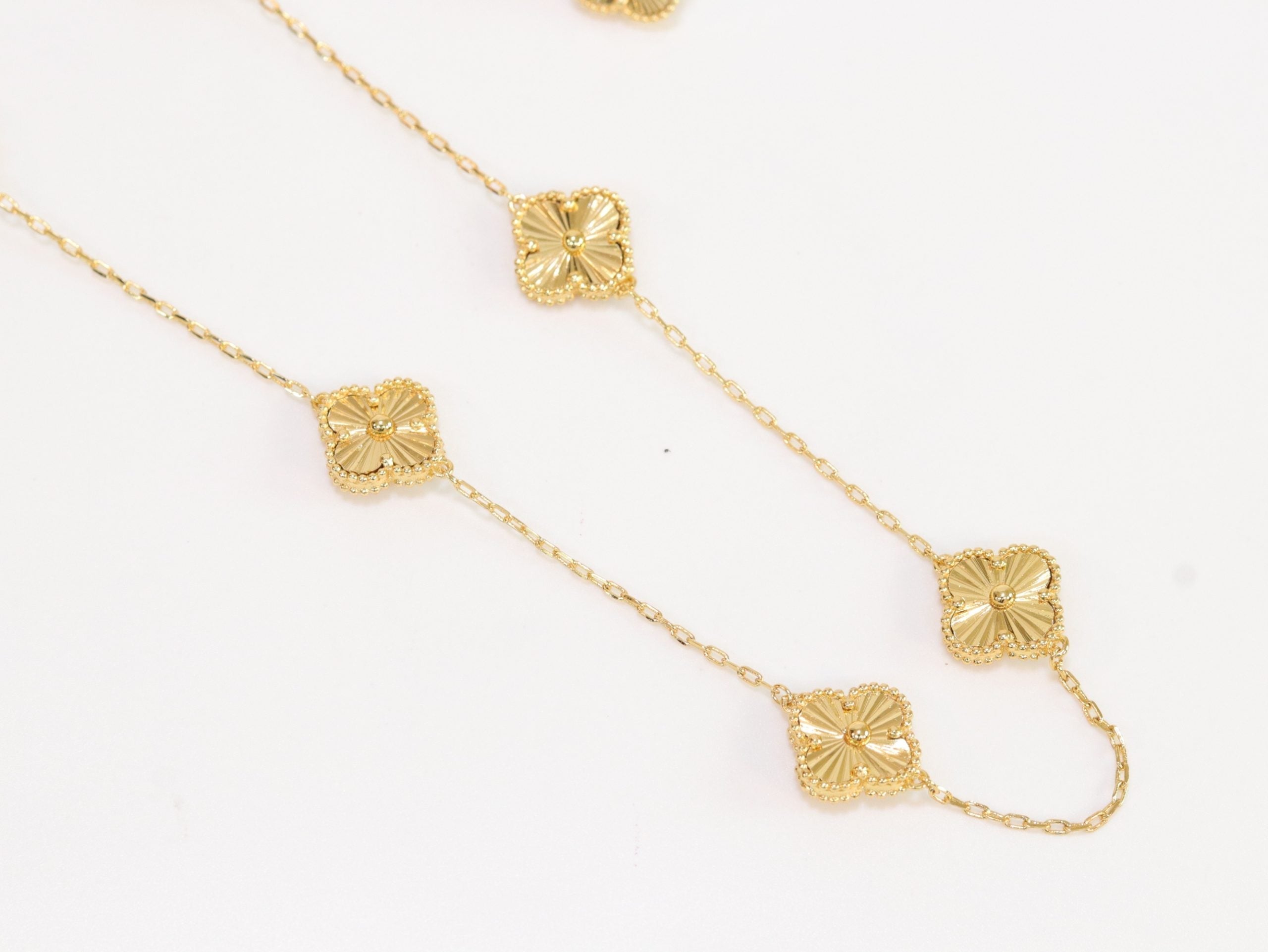 Gold clover necklace set