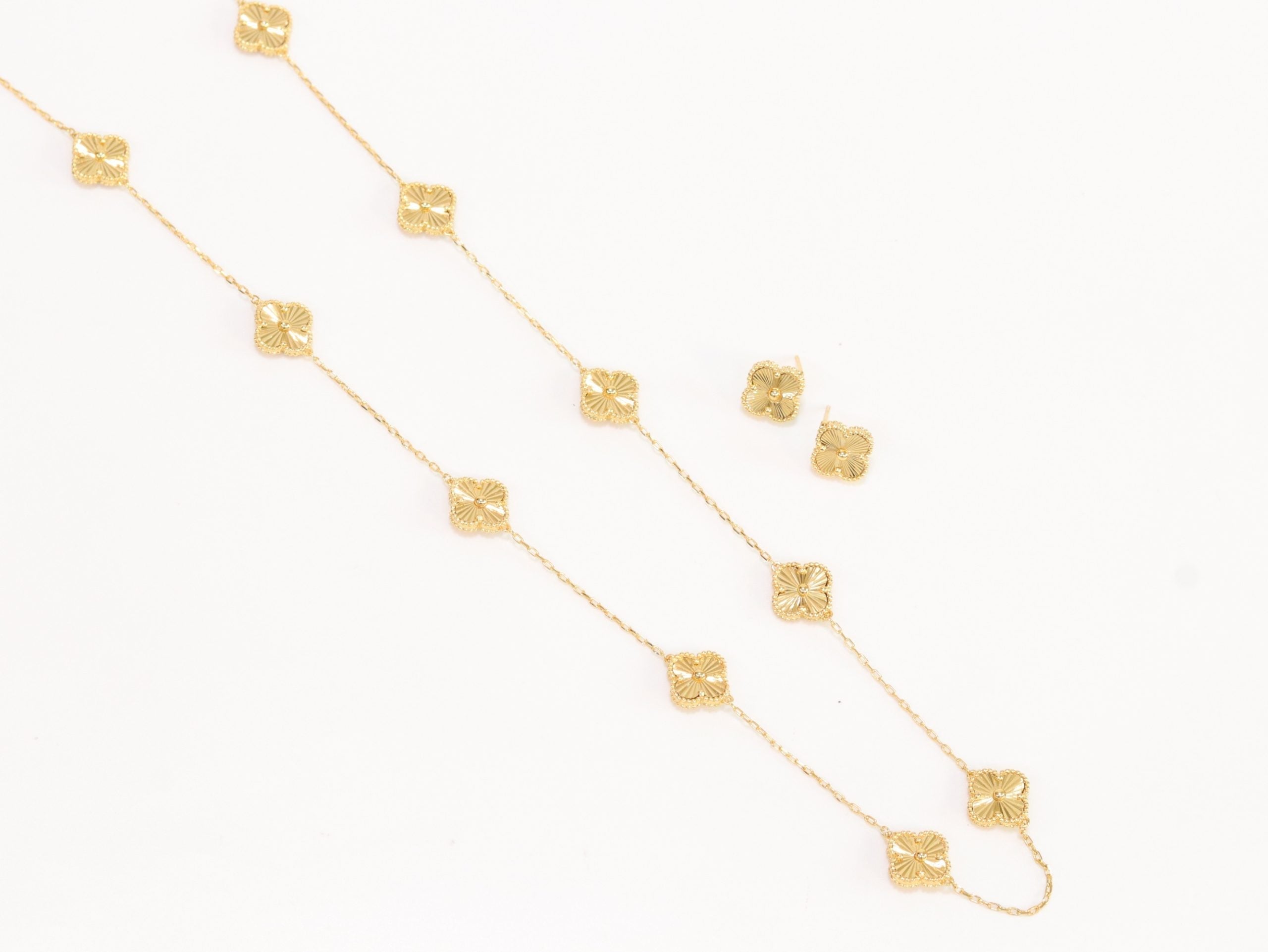 Gold clover necklace set