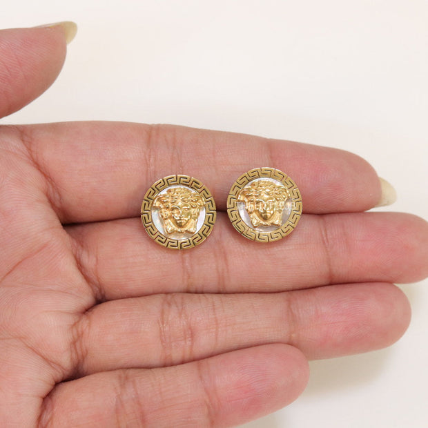 Gold plated Medusa studs in white enamel coating