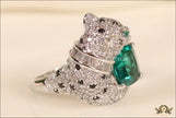 Panther ring with round emerald stone