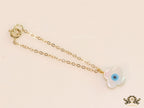 Clover leaf shaped mother of pearl watch charm with evil eye and gold plated chain