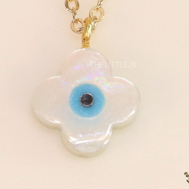 Clover leaf shaped mother of pearl watch charm with evil eye and gold plated chain