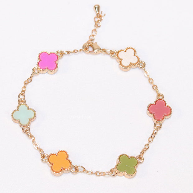 Golden chain bracelet with multi colored clovers