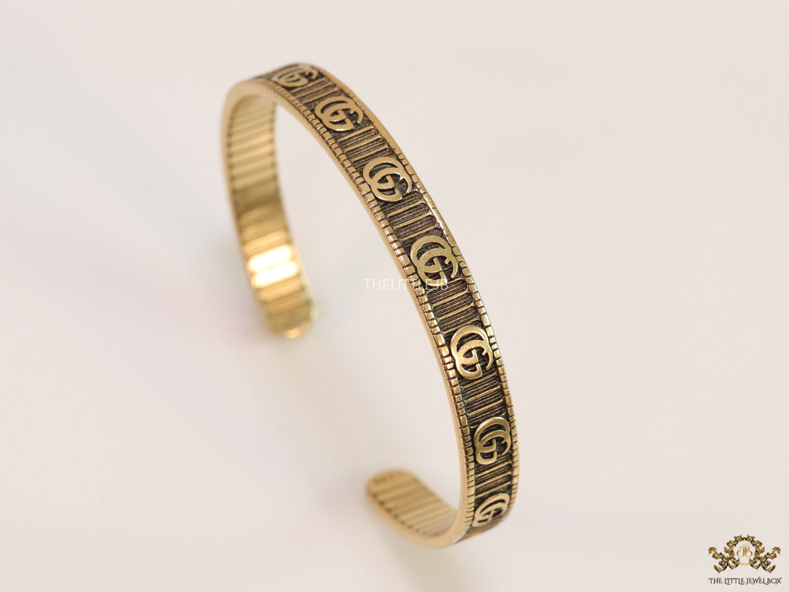Open Gold plated double G motif bracelet in antique finish