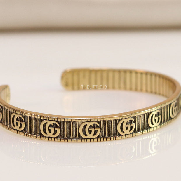 Open Gold plated double G motif bracelet in antique finish