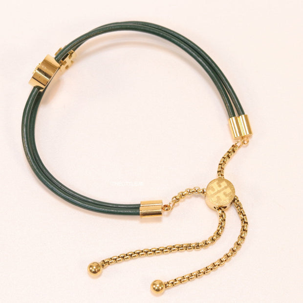 Adjustable double string green bracelet with twin T motifs