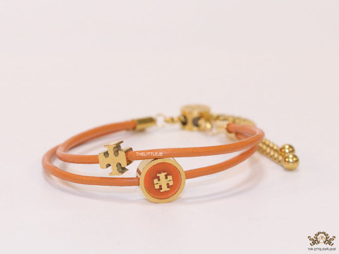 Adjustable double string orange bracelet with twin T motifs