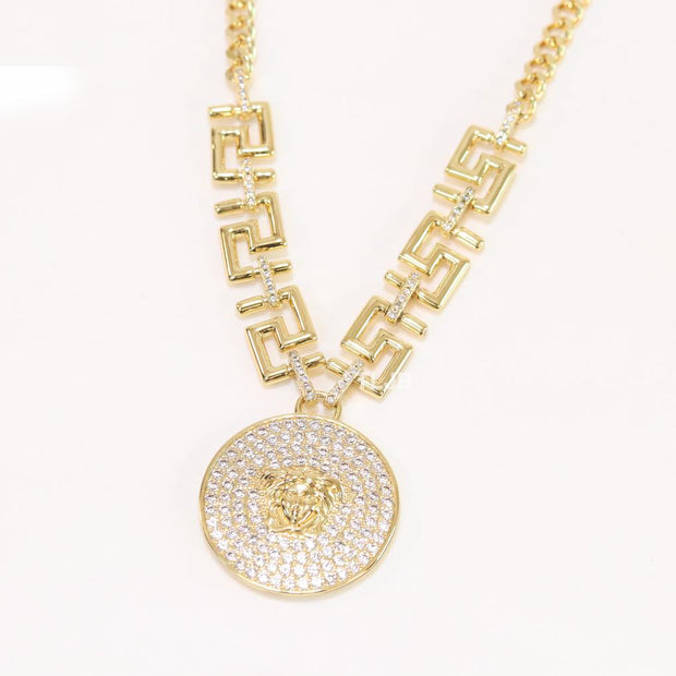 Medusa round pendant with gold link chain