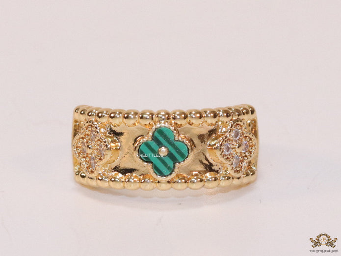 Golden ring band with malachite green and cz clovers