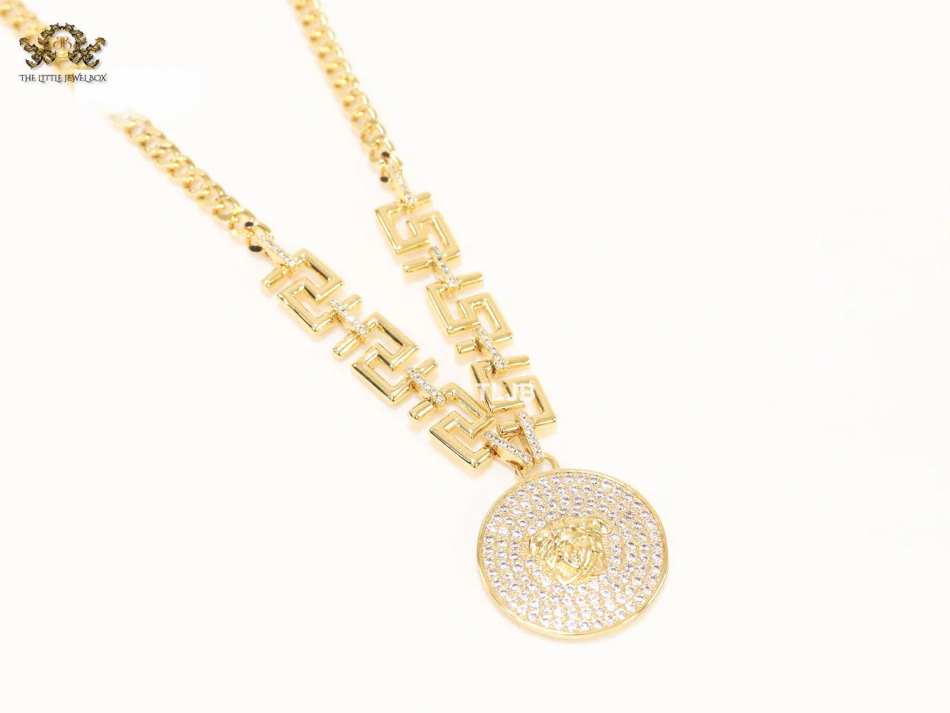 Medusa round pendant with gold link chain