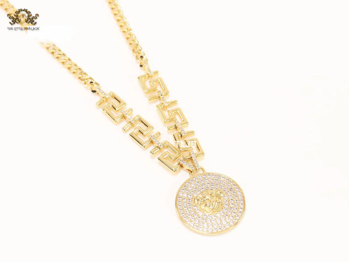 Medusa round pendant with gold link chain