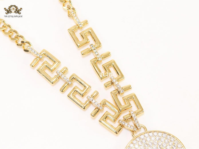 Medusa round pendant with gold link chain