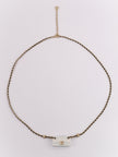 Double C enamel Bag on a black and gold chain