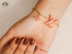 alphabet LV sleek flower pink bracelet