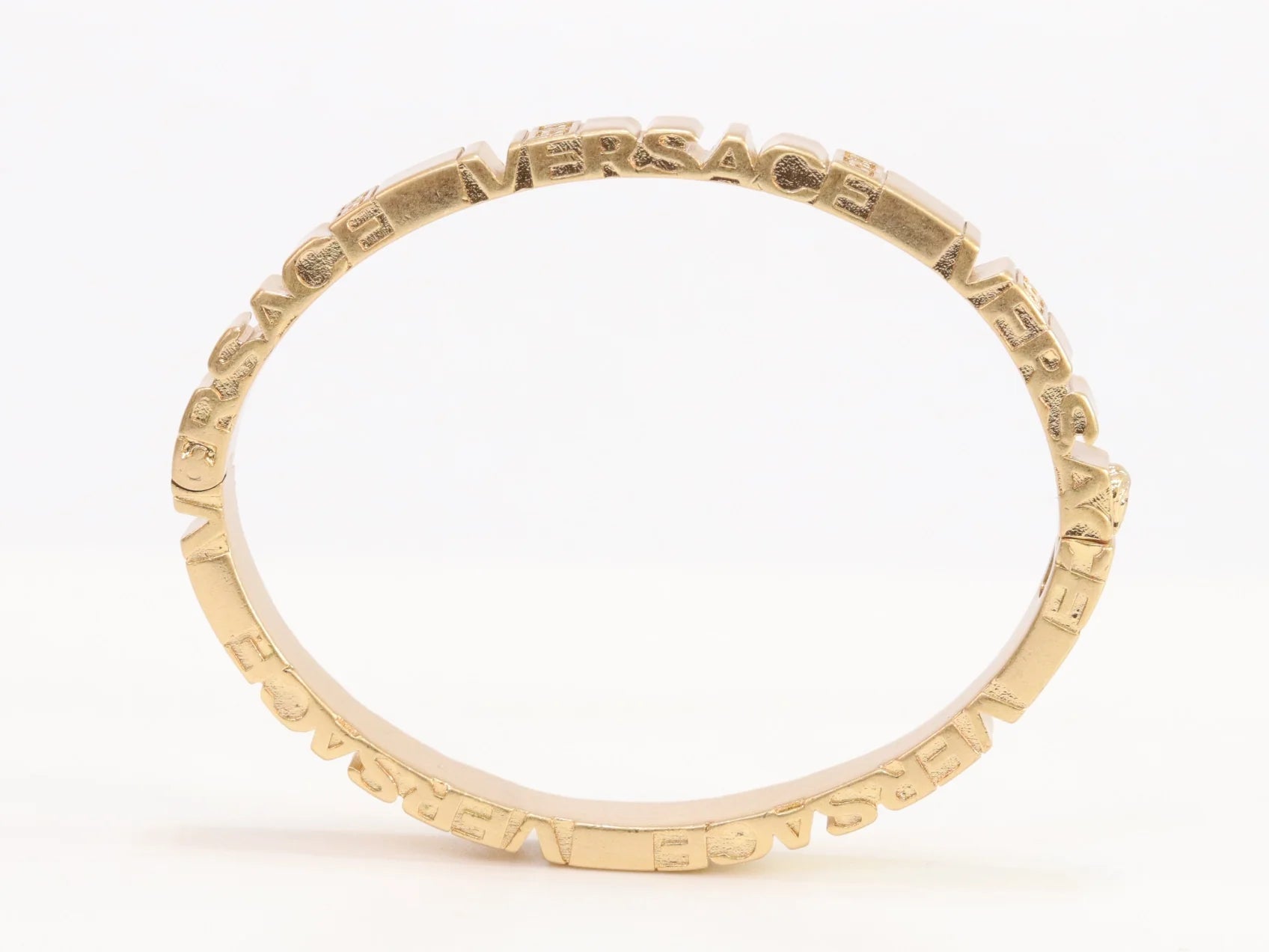 Medusa gold plated open bracelet