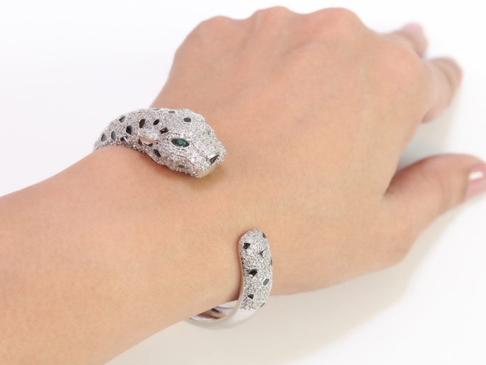 Panther cz platinum bracelet with emerald green stones
