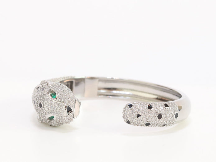 Panther cz platinum bracelet with emerald green stones