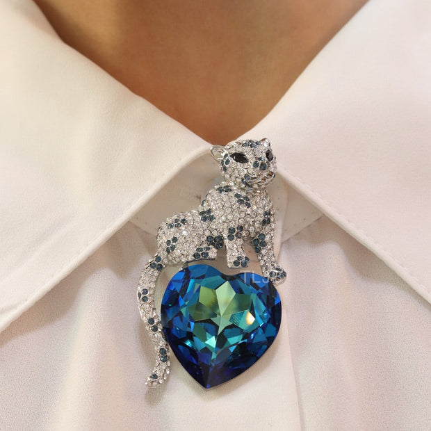 Panther on heart-shaped London blue topaz brooch