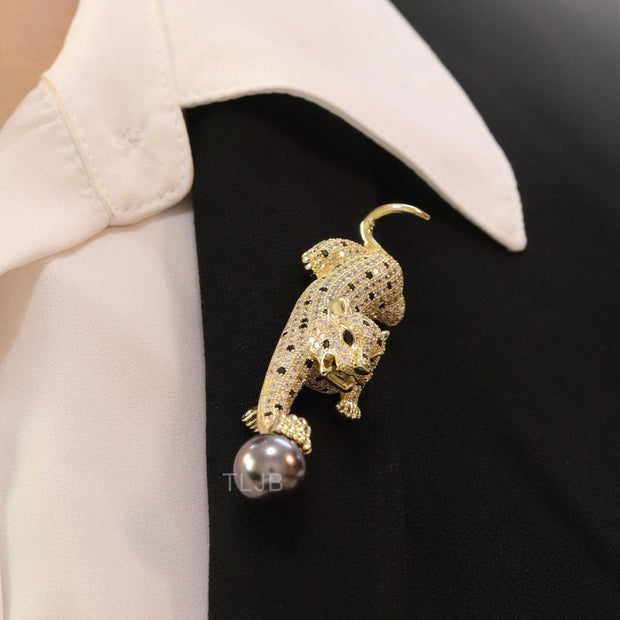 Gold panther with grey pearl and cz brooch