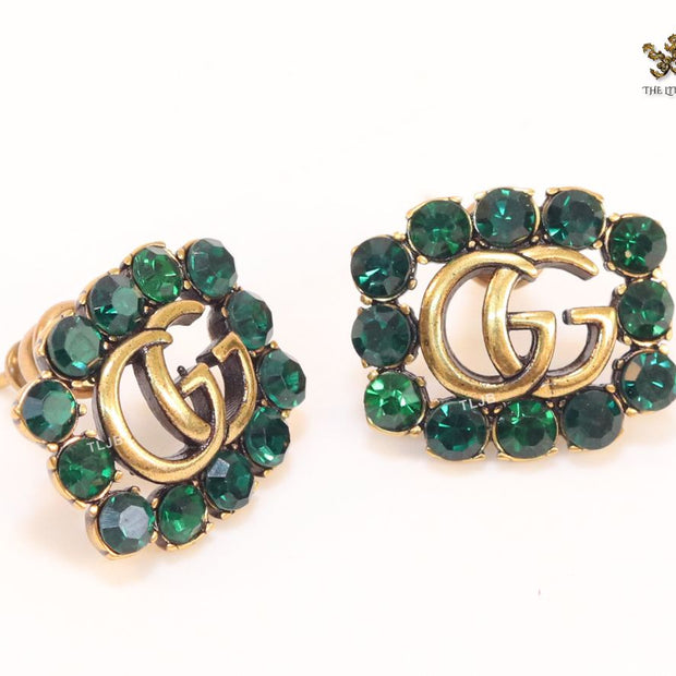 Double G emerald stones studs