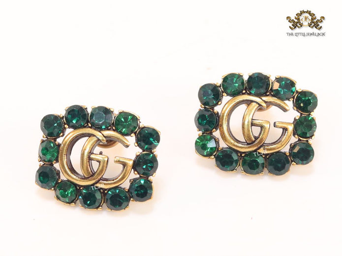 Double G emerald stones studs