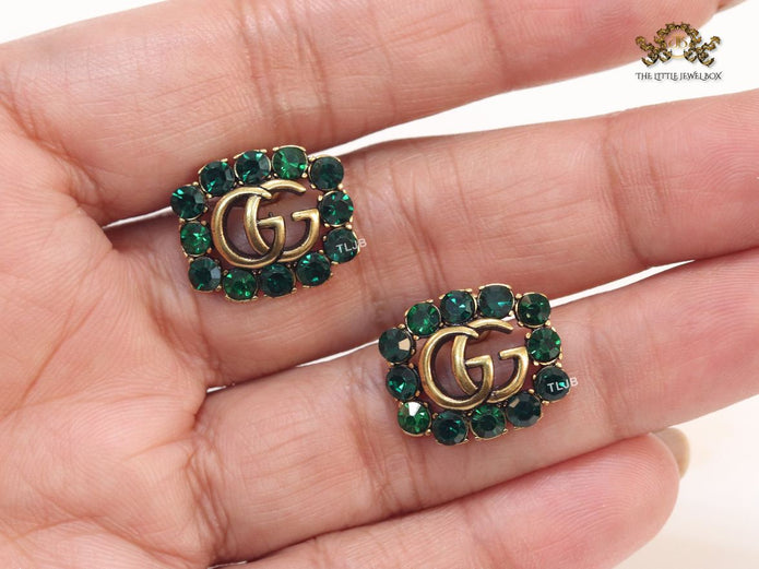 Double G emerald stones studs