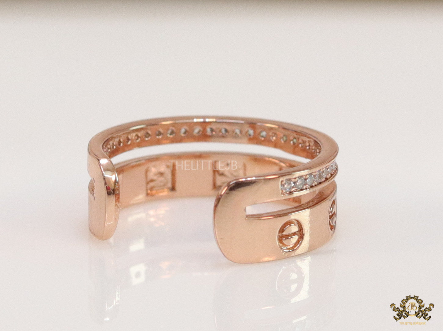 Double layered rose gold finish open ring with screws and cz