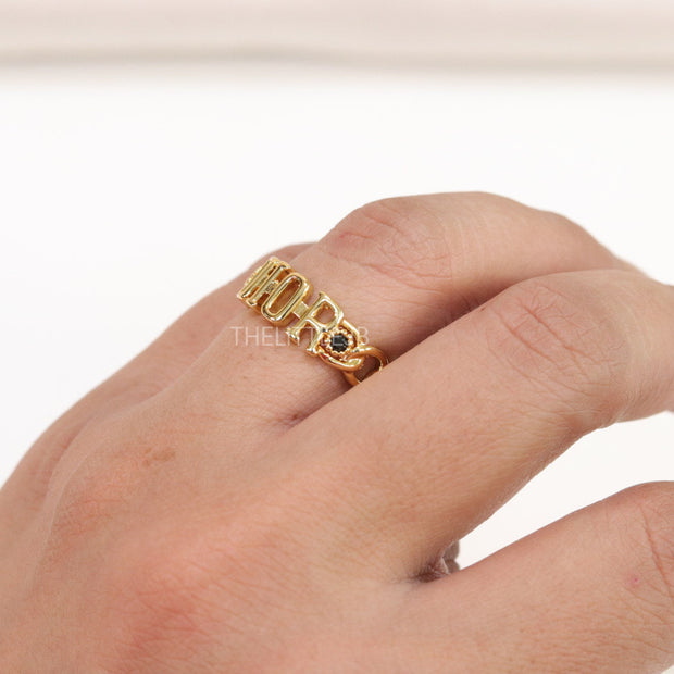 Gold plated alphabet open ring with black cz