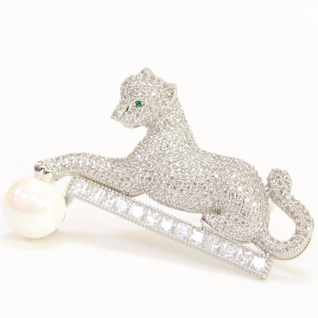 Platinum panther with white pearl, cz and emerald stones brooch