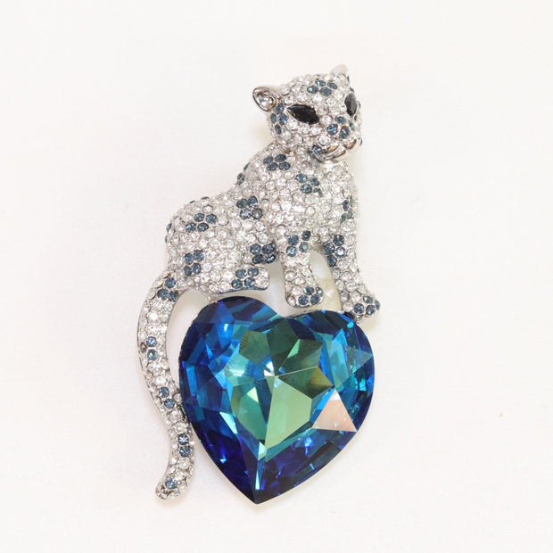 Panther on heart-shaped London blue topaz brooch