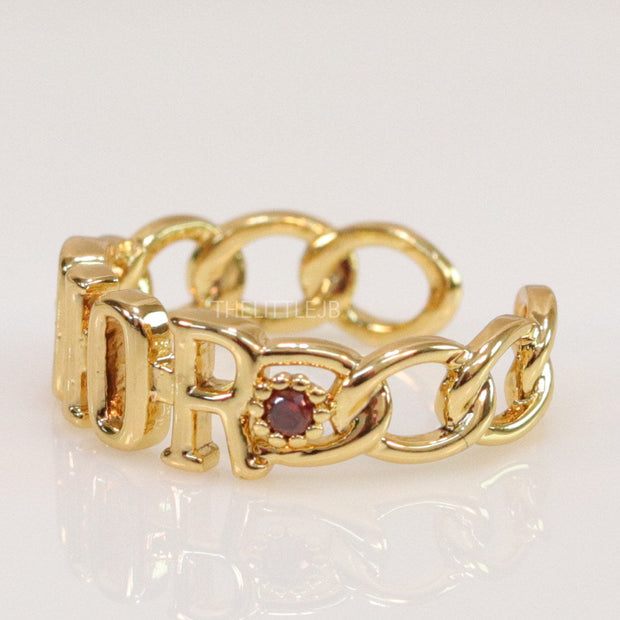 Gold plated alphabet open ring with orange cz