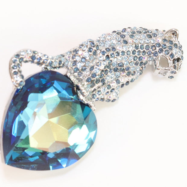 Inverted panther on heart-shaped London blue topaz brooch