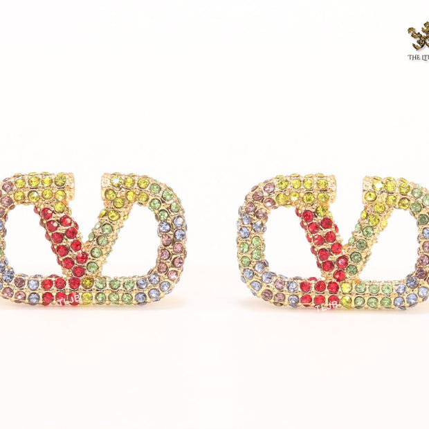 Alphabet V multi coloured studs