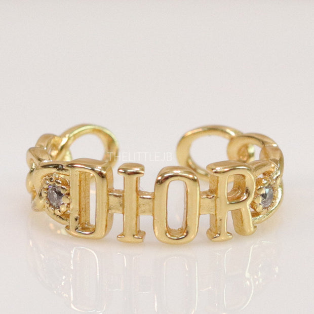 Gold plated alphabet open ring with white cz
