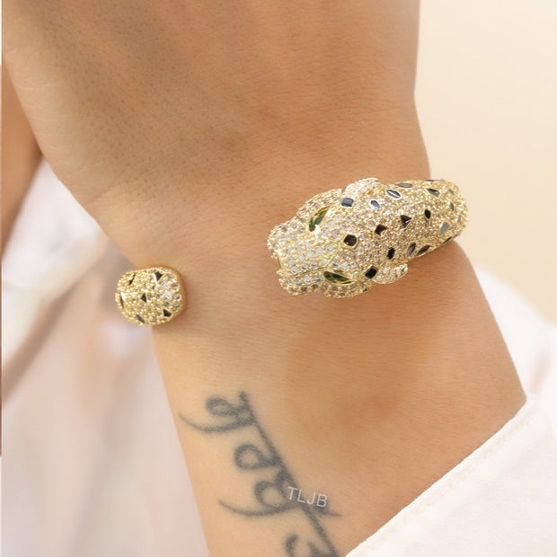 Panther cz gold bracelet with emerald green stones