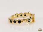 Gold finish alphabet open ring with black cz