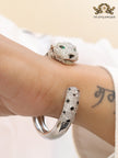 Panther cz platinum bracelet with emerald green stones