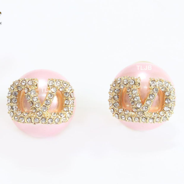 Pink pearl open studs