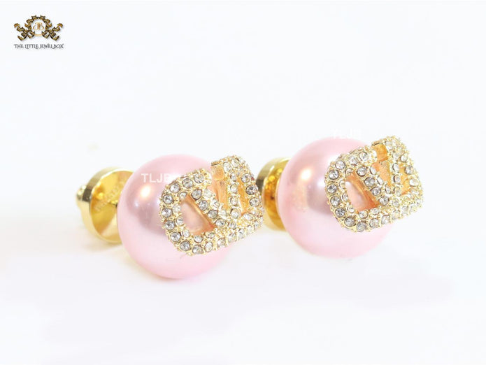 Pink pearl open studs
