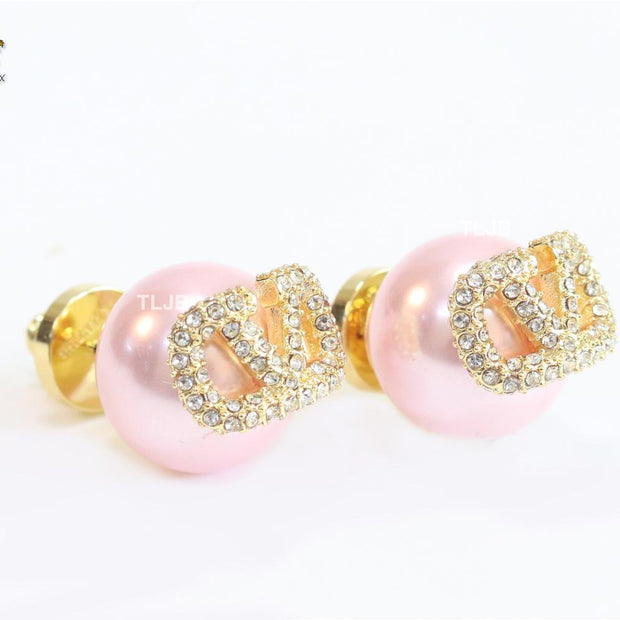 Pink pearl open studs