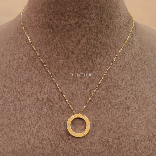 Gold plated disc shape pendant necklace with cz