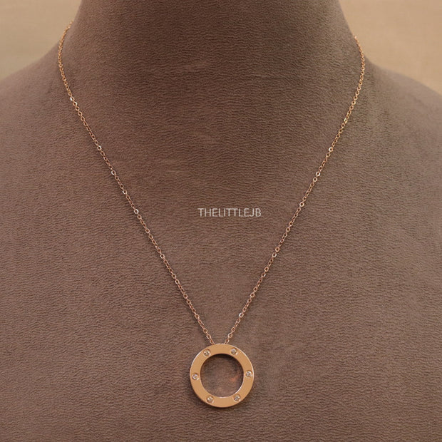 Rose gold plated disc shape pendant necklace with cz