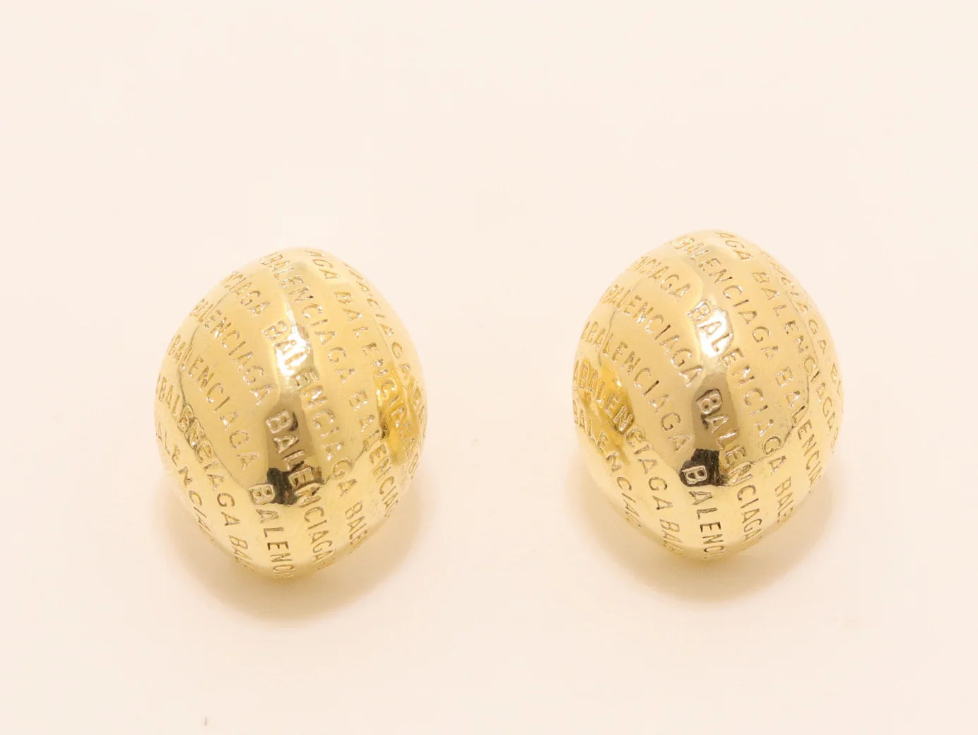 Gold alphabet embossed studs