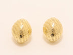 Gold alphabet embossed studs